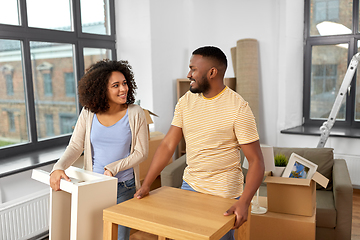 Image showing happy couple moving to new home