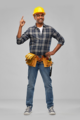 Image showing happy indian builder in helmet with tool belt