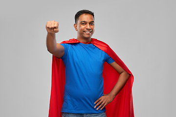 Image showing indian man in superhero cape makes winning gesture