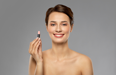 Image showing beautiful smiling young woman with pink lipstick