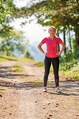 Image showing woman enjoying in a healthy lifestyle while jogging