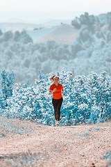 Image showing woman enjoying in a healthy lifestyle while jogging