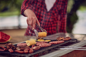 Image showing man cooking tasty food for french dinner party