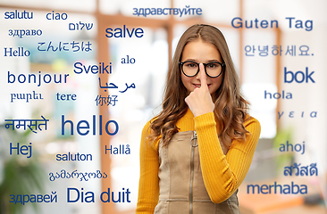 Image showing student girl over words in foreign languages