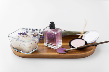 Image showing sea salt, perfume and lavender on wooden tray