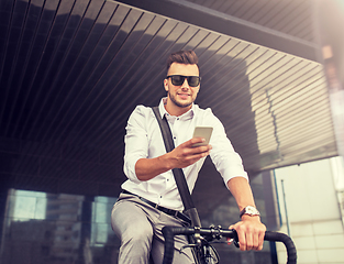 Image showing man with bicycle and smartphone on city street