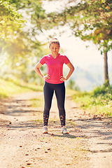 Image showing woman enjoying in a healthy lifestyle while jogging