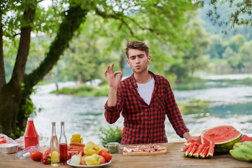 Image showing man cooking tasty food for french dinner party