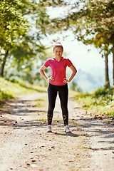 Image showing woman enjoying in a healthy lifestyle while jogging