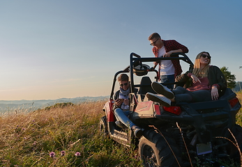 Image showing group young happy people enjoying beautiful sunny day while driving a off road buggy car