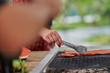 Image showing man cooking tasty food for french dinner party