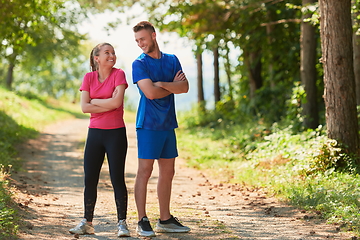 Image showing young couple preparing for a morning run