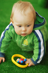 Image showing Child with a toy