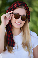 Image showing portrait of beautiful, emotional, young woman in sunglasses.