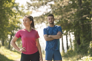 Image showing young couple preparing for a morning run