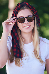 Image showing portrait of beautiful, emotional, young woman in sunglasses.