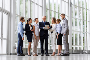 Image showing business people with tablet pc computer at office