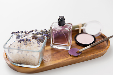 Image showing sea salt, perfume and lavender on wooden tray