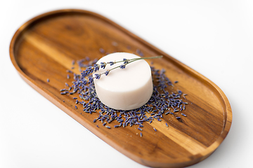 Image showing close up of crafted lavender soap on wooden tray