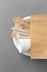 Image showing wooden spoons, forks and knives on paper plate