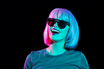 Image showing happy woman in pink wig and black sunglasses