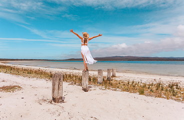 Image showing Female joy freedom live life to the full travel beach concept