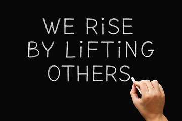 Image showing We Rise By Lifting Others Teamwork Concept