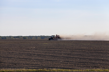 Image showing processing field tractor