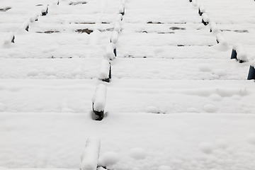 Image showing Old wooden benches