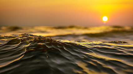 Image showing golden sunset ocean wave background