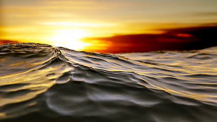 Image showing golden sunset ocean wave background