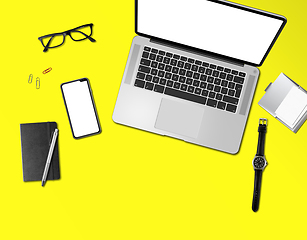 Image showing Office desk mockup top view isolated on yellow