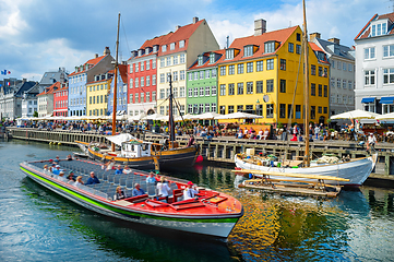 Image showing Touristic boat cruising by Nyhavn 