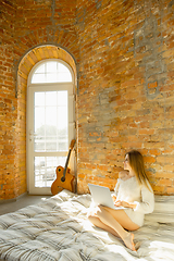 Image showing Beautiful young woman relaxing at home, comfort and calm