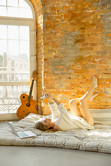 Image showing Beautiful young woman relaxing at home, comfort and calm