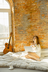 Image showing Beautiful young woman relaxing at home, comfort and calm