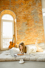 Image showing Beautiful young woman relaxing at home, comfort and calm