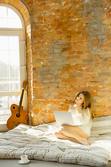 Image showing Beautiful young woman relaxing at home, comfort and calm