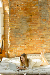 Image showing Beautiful young woman relaxing at home, comfort and calm