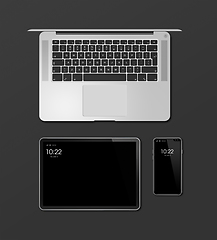 Image showing Laptop, tablet and phone set mockup isolated on black. 3D render