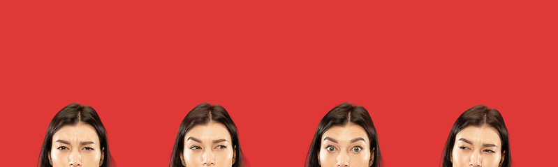 Image showing Caucasian young woman\'s close up portrait on red background