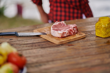 Image showing man cooking tasty food for french dinner party