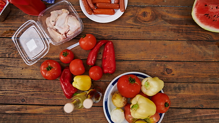 Image showing Vegetables. Fresh Bio Vegetable and meat Over wooden Background. Top view