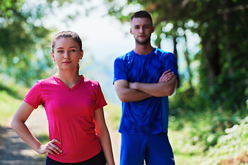 Image showing young couple preparing for a morning run