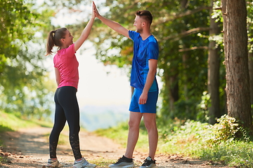 Image showing young couple preparing for a morning run