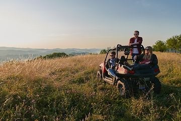 Image showing group young happy people enjoying beautiful sunny day while driving a off road buggy car