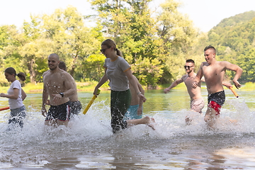 Image showing group of happy friends having fun on river