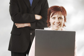 Image showing A woman with a notebook