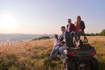 Image showing group young happy people enjoying beautiful sunny day while driving a off road buggy car