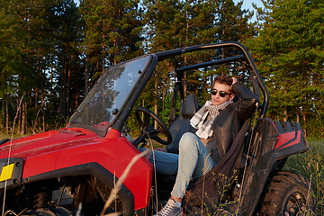 Image showing man enjoying beautiful sunny day while driving a off road buggy car